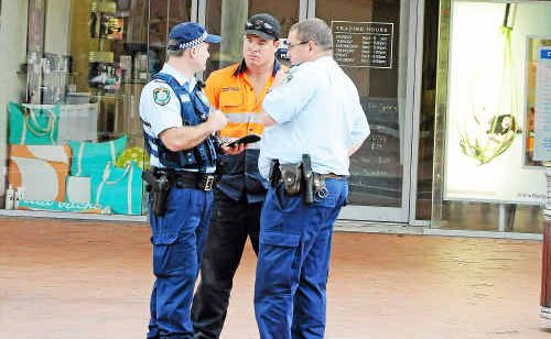 Police interview witnesses in Harbour Drive on Wednesday afternoon. Police interview witnesses in Harbour Drive on Wednesday afternoon.